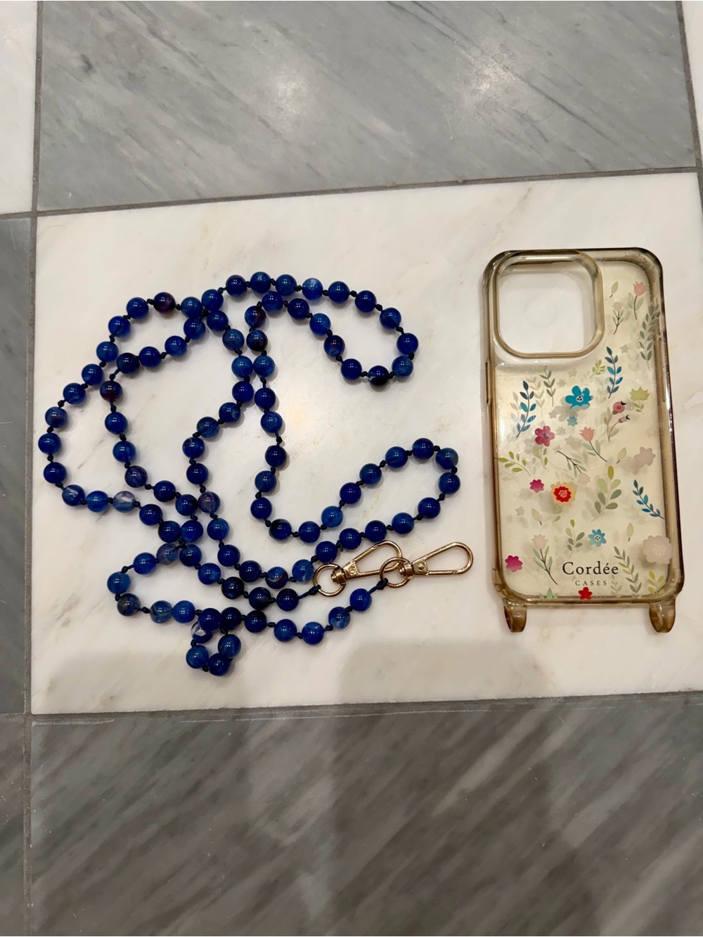 Cordee Floral Clear iPhone 14 Pro Case with Blue Lagoon Phone Chain